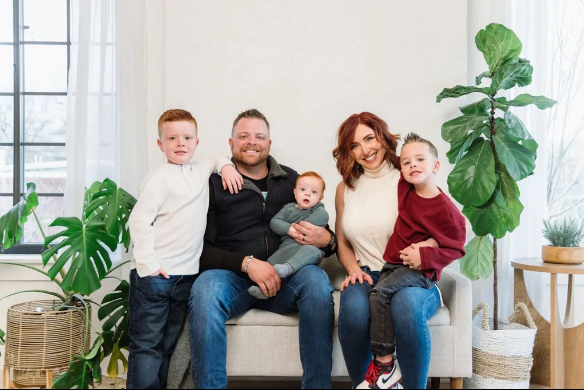 Trent May with his wife and three sons
